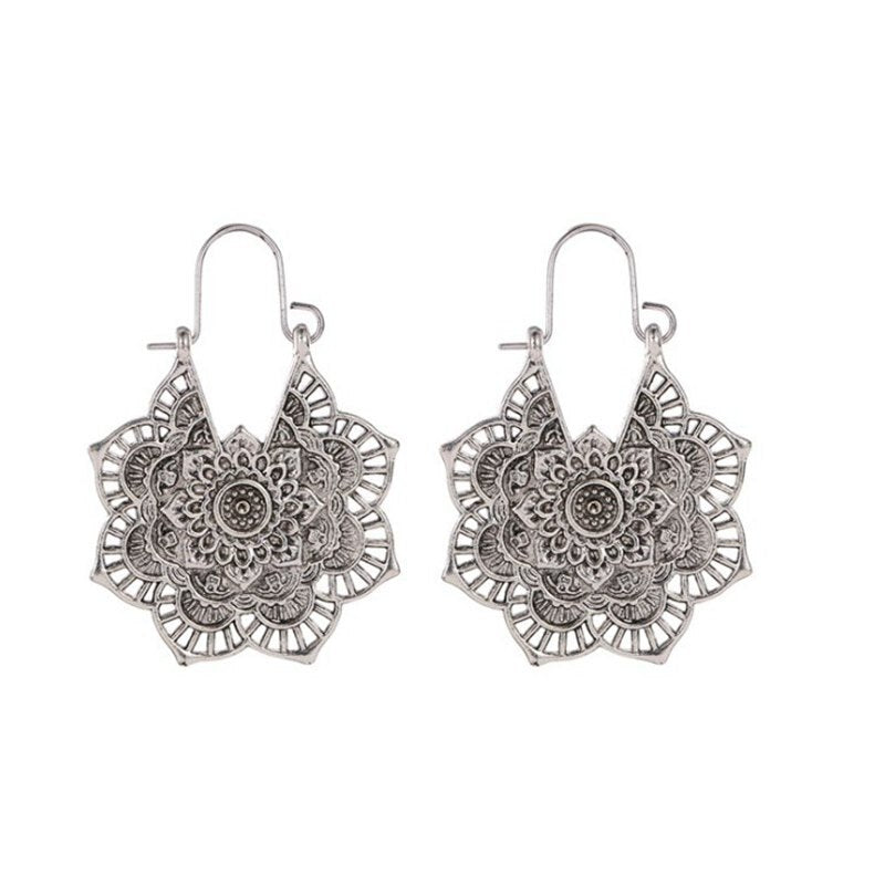 National wind earrings exquisite retro metal hollow flower earrings bohemian carved aristocratic wind earrings ladies jewelry