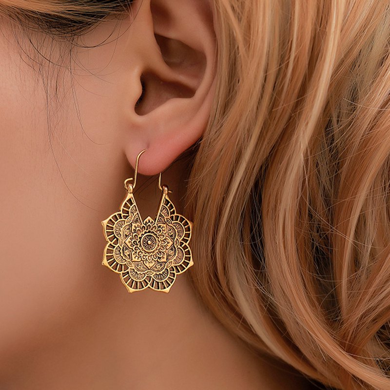 National wind earrings exquisite retro metal hollow flower earrings bohemian carved aristocratic wind earrings ladies jewelry